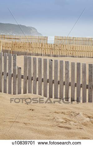 Wooden fences on beach View Large Photo Image Stock Image - Wooden fences on beach. Fotosearch