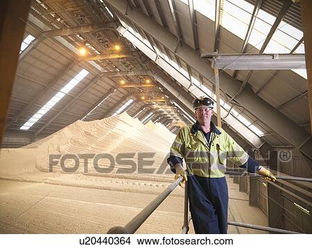 Worker at gypsum facility View Large Photo Image Picture - Worker at gypsum facility. Fotosearch