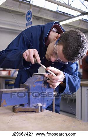 Worker using saw in factory View Large Photo Image Stock Photo - Worker using saw in factory. Fotosearch