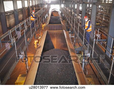 Workers watching coal trucks in facility View Large Photo Image Stock Photo - Workers watching coal trucks in facility. Fotosearch
