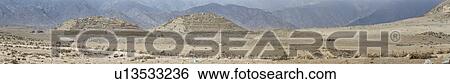 Caral ancient ruins: panorama of temple mounds with mountains beyond, Supe Valley, Peru View Large Photo Image Stock Photograph - Caral ancient ruins: panorama of temple mounds with mountains beyond, Supe Valley, Peru. Fotosearch