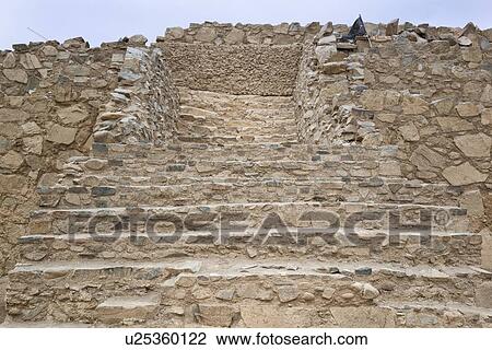 Stock Image - Caral ancient ruins: stonework detail of temple mound, Supe Valley, Peru. Fotosearch