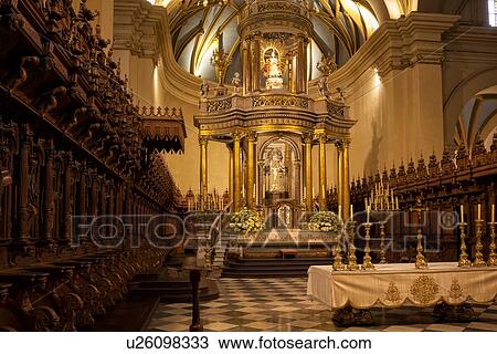 Catedral of Lima: detail of gilded altar seen from side, with graceful gilded ribbed arched ceiling, ornately carved wooden roccoco choir stalls Spanish Baroque, Lima, Peru View Large Photo Image Stock Image - Catedral of Lima: detail of gilded altar seen from side, with graceful gilded ribbed arched ceiling, ornately carved wooden roccoco choir stalls Spanish Baroque, Lima, Peru. Fotosearch