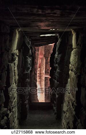 Stock Photo - Chavin de Huantar ruins: labyrinthine tunnel with Lanzon de Chavin carved obelisk, Cordilleras, Peru. Fotosearch