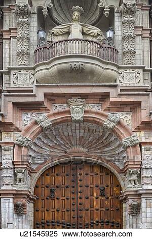 Stock Photography - Detail of Iglesia San Merced granite church facade and doorway, with ornate Spanish Baroque stone carving, Lima, Peru. Fotosearch