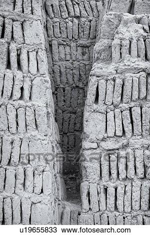 Stock Image - Huaca Pucllana: monochrome detail of adobe mud brick walls dating back to Lima culture of 400AD, Lima, Peru. Fotosearch