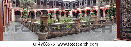 Iglesia de Santo Domingo cloister with red and white arches, ornate wooden balustrade above, Spanish tile decor, Spanish Baroque, panorama, Lima, Peru View Large Photo Image Stock Photography - Iglesia de Santo Domingo cloister with red and white arches, ornate wooden balustrade above, Spanish tile decor, Spanish Baroque, panorama, Lima, Peru. Fotosearch
