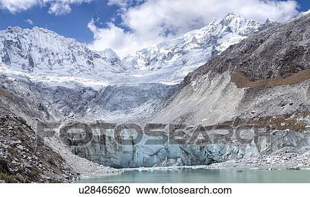 Llaca valley: glacier and moraine, with river and snow-capped mountains beyond, blue sky and dramatic clouds, close up view, Cordilleras, Peru View Large Photo Image Stock Image - Llaca valley: glacier and moraine, with river and snow-capped mountains beyond, blue sky and dramatic clouds, close up view, Cordilleras, Peru. Fotosearch