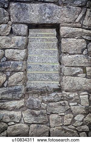 Machu Picchu Inca ruins: detail of trapezoidal window, with agricultural terracing beyond, Machu Picchu, Sacred Valley, Peru View Large Photo Image Stock Image - Machu Picchu Inca ruins: detail of trapezoidal window, with agricultural terracing beyond, Machu Picchu, Sacred Valley, Peru. Fotosearch