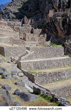 Stock Photograph - Ollantaytambo: detail of stone stairway, and agricultural terracing of Inca citadel, Ollantaytambo, Sacred Valley, Cuzco, Peru. Fotosearch