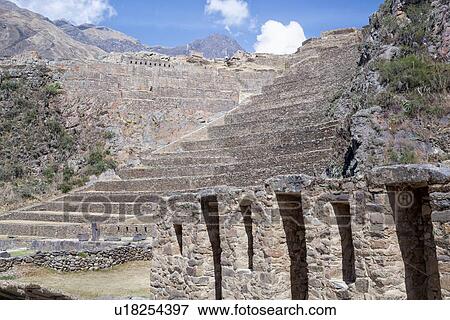 Ollantaytambo: stone stairway and agricultural terracing of Inca citadel,, flanked by mountains of Sacred valley, sunny early morning, Ollantaytambo, Sacred Valley, Cuzco, Peru View Large Photo Image Stock Photo - Ollantaytambo: stone stairway and agricultural terracing of Inca citadel,, flanked by mountains of Sacred valley, sunny early morning, Ollantaytambo, Sacred Valley, Cuzco, Peru. Fotosearch