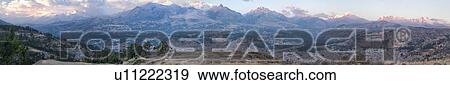 Panorama view at sunset of snow-capped Cordilleras mountains with town of Huaraz in valley, Cordilleras, Peru View Large Photo Image Stock Photo - Panorama view at sunset of snow-capped Cordilleras mountains with town of Huaraz in valley, Cordilleras, Peru. Fotosearch