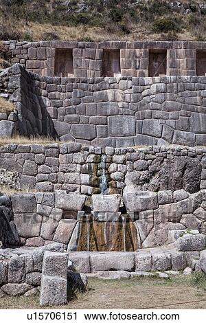 Tambomachay: view of ceremonial Inca stone baths with running fountain in hewn rock, Sacred Valley, Cuzco, Peru View Large Photo Image Stock Image - Tambomachay: view of ceremonial Inca stone baths with running fountain in hewn rock, Sacred Valley, Cuzco, Peru. Fotosearch