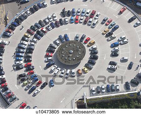 Aerial view of circular parking lot View Large Photo Image Stock Photography - Aerial view of circular parking lot. Fotosearch