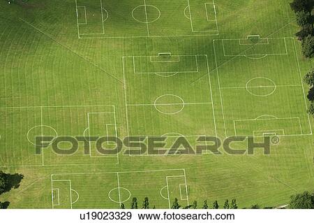 Stock Photo - Aerial view of soccer pitches in field. Fotosearch