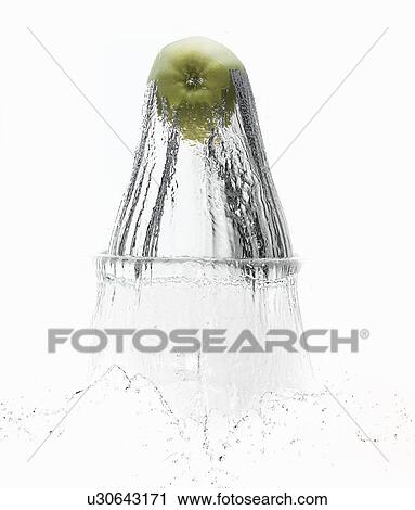 Apple splashing in water View Large Photo Image Stock Image - Apple splashing in water. Fotosearch