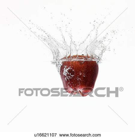 Stock Photo - Apple splashing in water. Fotosearch