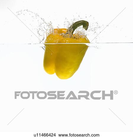Bell pepper splashing in water View Large Photo Image Picture - Bell pepper splashing in water. Fotosearch