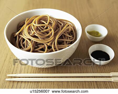 Bowl of noodles with chopsticks View Large Photo Image Stock Photo - Bowl of noodles with chopsticks. Fotosearch