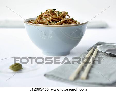 Stock Photography - Bowl of noodles with chopsticks. Fotosearch