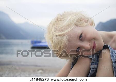 Boy smiling on beach View Large Photo Image Stock Photograph - Boy smiling on beach. Fotosearch