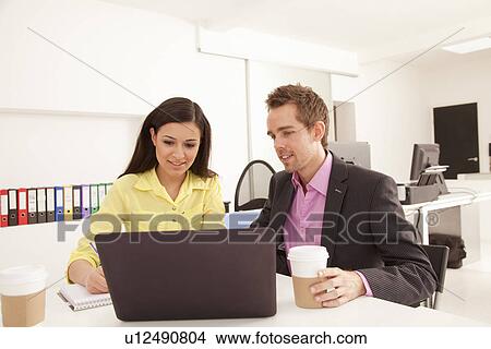 Picture - Business people at work in office. Fotosearch