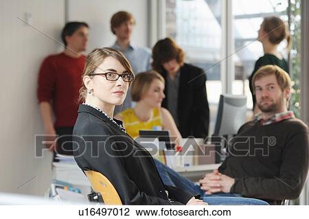 Business people working in office View Large Photo Image Stock Image - Business people working in office. Fotosearch