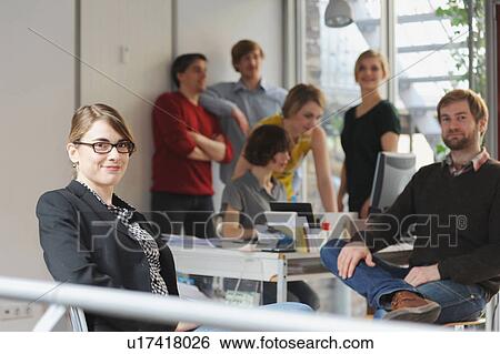 Business people working in office View Large Photo Image Stock Photograph - Business people working in office. Fotosearch
