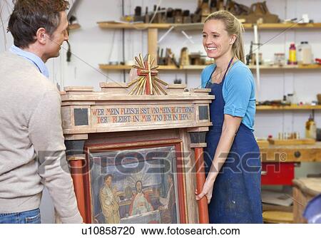 Carpenters carrying antique art piece View Large Photo Image Stock Image - Carpenters carrying antique art piece. Fotosearch