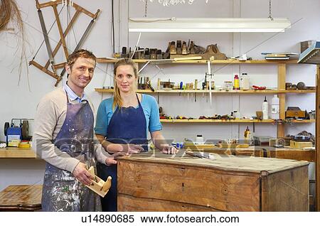 Carpenters working on wooden drawers View Large Photo Image Stock Photography - Carpenters working on wooden drawers. Fotosearch