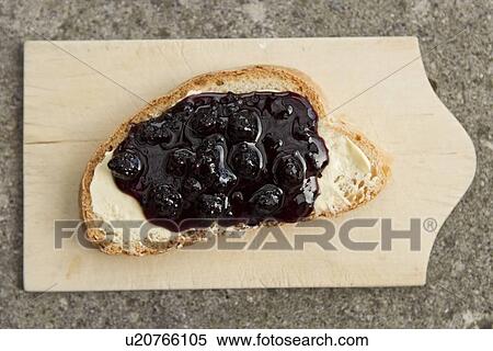 Close up of blueberry jam on bread View Large Photo Image Stock Photography - Close up of blueberry jam on bread. Fotosearch