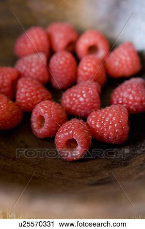 Close up of bowl of raspberries View Large Photo Image Stock Image - Close up of bowl of raspberries. Fotosearch