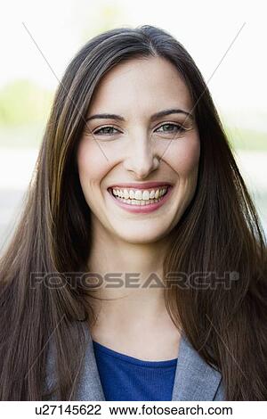 Close up of businesswomans smiling face View Large Photo Image Stock Image - Close up of businesswomans smiling face. Fotosearch