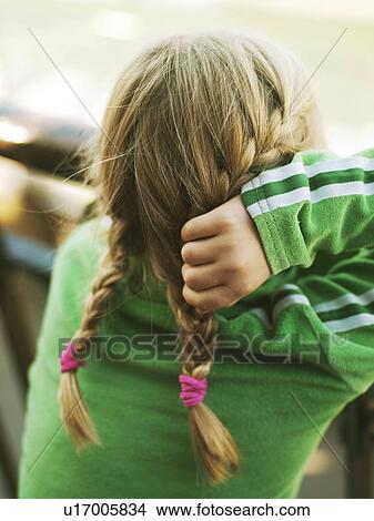 Picture - Close up of girls braid pigtails. Fotosearch