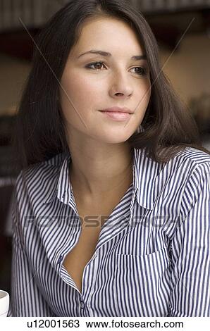 Stock Image - Close up of girls smiling face. Fotosearch