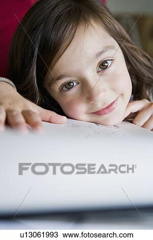 Close up of girls smiling face View Large Photo Image Stock Image - Close up of girls smiling face. Fotosearch