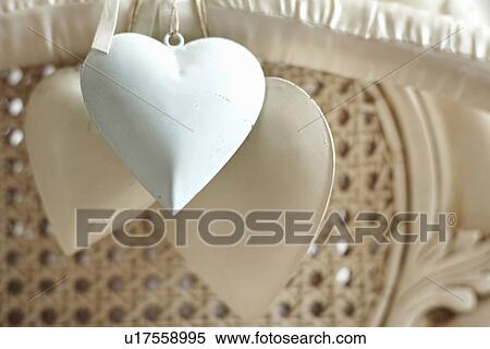 Close up of heart-shaped ornaments View Large Photo Image Stock Photography - Close up of heart-shaped ornaments. Fotosearch