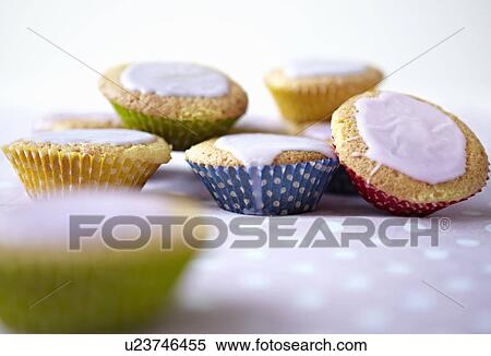 Close up of iced cupcakes View Large Photo Image Stock Photography - Close up of iced cupcakes. Fotosearch