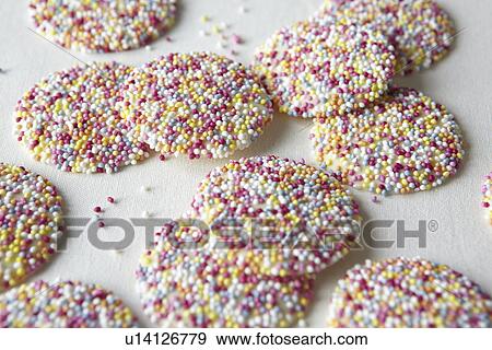 Close up of non pareil candies View Large Photo Image Stock Photo - Close up of non pareil candies. Fotosearch