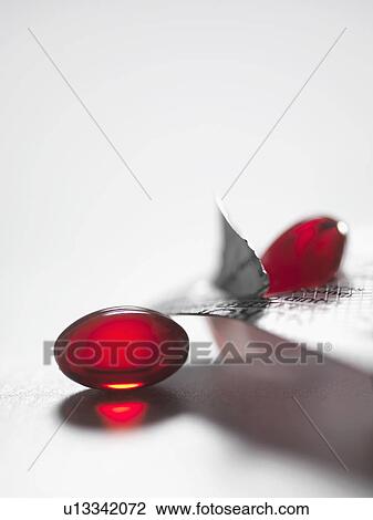 Stock Image - Close up of pain medicine. Fotosearch