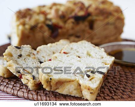 Picture - Close up of rustic fruit loaf. Fotosearch