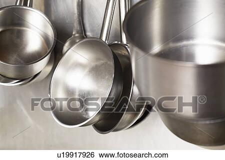 Close up of stainless steel pans View Large Photo Image Stock Photograph - Close up of stainless steel pans. Fotosearch