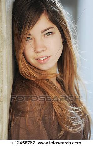 Stock Image - Close up of teenage girls face. Fotosearch