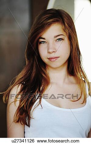 Close up of teenage girls smiling face View Large Photo Image Stock Photograph - Close up of teenage girls smiling face. Fotosearch