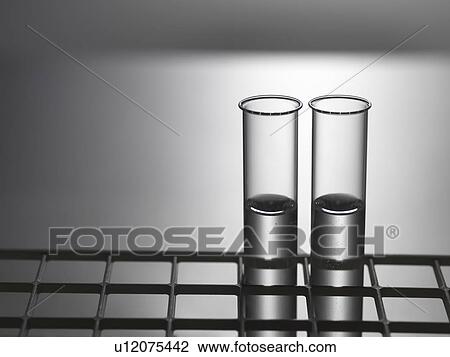 Close up of test tubes in rack View Large Photo Image Stock Image - Close up of test tubes in rack. Fotosearch