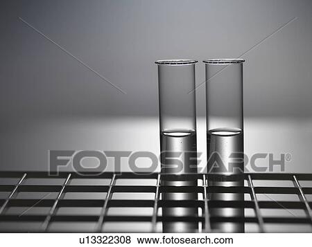 Close up of test tubes in rack View Large Photo Image Stock Photo - Close up of test tubes in rack. Fotosearch