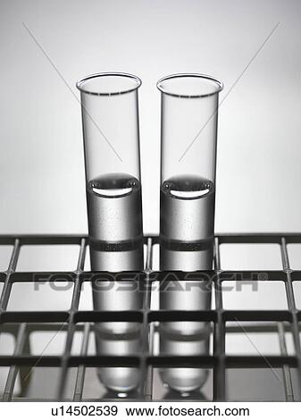 Close up of test tubes in rack View Large Photo Image Stock Photo - Close up of test tubes in rack. Fotosearch