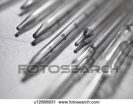 Close up of tips of pipettes View Large Photo Image Stock Image - Close up of tips of pipettes. Fotosearch