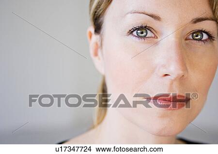 Close up of womans face View Large Photo Image Picture - Close up of womans face. Fotosearch