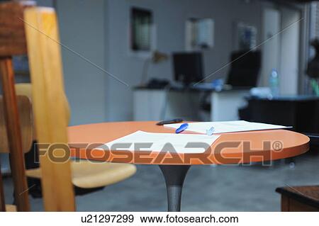 Empty desk and chairs in office View Large Photo Image Stock Photo - Empty desk and chairs in office. Fotosearch